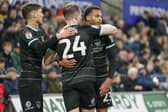 Pompey winger Josh Murphy is congratulated following his goal against Swansea on Saturday.