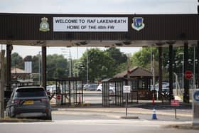An expert has said Russia or China can't be ruled out of orchestrating drones which flew over airbases. A similar aircraft was seen shadowing HMS Queen Elizabeth in Germany. Pictured: The entrance of RAF (Royal Air Force) Lakenheath, home of the US Air Force's 48th Fighter Wing.