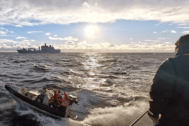 A Norwegian sea boat returning to HNoMS Maud while operating alongside HMS Iron Duke.
