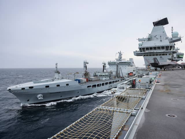 An "aging" and struggling Royal Fleet Auxiliary is causing sealift capability problems for the Royal Navy and UK, a research paper has said. Pictured: RFA Tidesurge mains a constant distance from HMS Prince of Wales as fuel is pumped across.