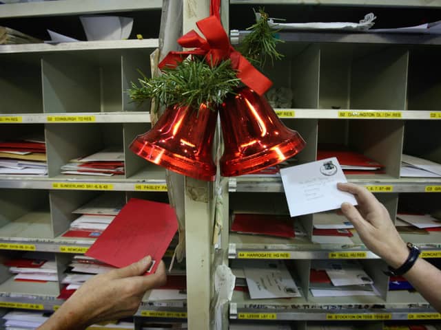 Royal Mail postal workers sort Christmas cards in the Royal Mail Regional Sorting Office in Filton (Photo: Matt Cardy/Getty Images)