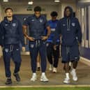 Kusini Yengi, centre, alongside Pompey team-mates Andre Dozzell and Abdoulaye Kamara