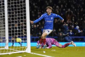 Callum Lang scored and picked up a booking in Pompey's 3-0 win against Bristol City