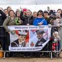 Family and friends gathered to welcome loved ones home to Portsmouth, who had been serving on HMS Duncan for over six months. The Royal Navy Type 45 Destroyer returned back to the naval base for Christmas. Pictured - family waiting for Warrant Officer Daz Hemmings (54) at HMNB Portsmouth.