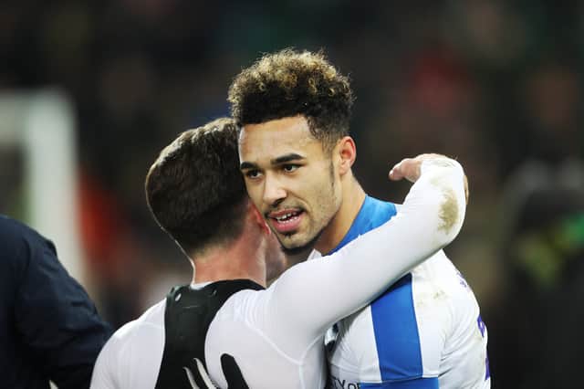 Ben Thompson embraces match-winner Andre Green following Pompey's 1-0 triumph at Norwich in January 2019. Picture: Joe Pepler