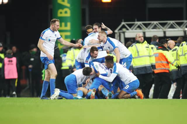 Andre Green and his Pompey team-mates celebrate his dramatic winner at Norwich in January 2019. Picture: Joe Pepler