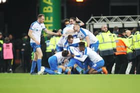 Andre Green and his Pompey team-mates celebrate his dramatic winner at Norwich in January 2019. Picture: Joe Pepler