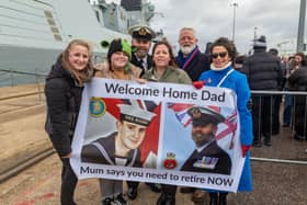 Warrant Officer Daz Hemmings (54) reunited with his family at HMNB Portsmouth.