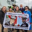 Warrant Officer Daz Hemmings (54) reunited with his family at HMNB Portsmouth.