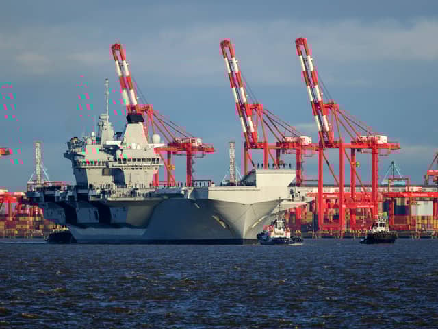 A police investigation is underway after a drone was seized after flying close to HMS Prince of Wales and inside a flight restriction zone in Liverpool during an official visit.