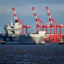 A police investigation is underway after a drone was seized after flying close to HMS Prince of Wales and inside a flight restriction zone in Liverpool during an official visit.