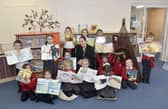 Bidbury Infant School in Bedhampton, has been given a good Ofsted following its recent inspection. 

Pictured is: (middle) Acting headteacher Julia Quehan with some of the infant school children.Picture: Sarah Standing (281124-6609)