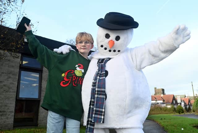 Getting into the festive spirit as residents, businesses and groups take part in the second annual Coppull Snowman Festival.