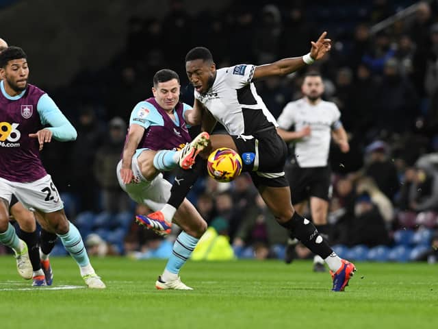 Pompey new-boy Ebou Adams relishes a tackle. Pictured for Derby against Burnley in April 2025. Picture: Liam Ford/AHPIX LTD