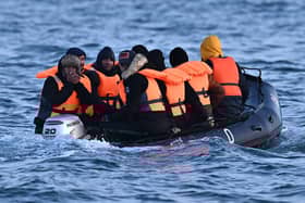 A defence minister has confirmed that Royal Navy ships will not be used to deal with small boats crossing The English Channel. Pictured: Migrants travel in an inflatable boat across the English Channel, bound for Dover on the south coast of England, in 2023.