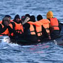 A defence minister has confirmed that Royal Navy ships will not be used to deal with small boats crossing The English Channel. Pictured: Migrants travel in an inflatable boat across the English Channel, bound for Dover on the south coast of England, in 2023.