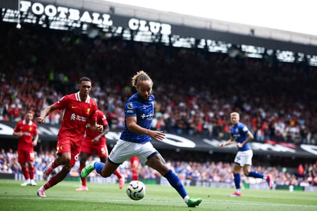 Ex-Pompey man Marcus Harness in Premier League action for Ipswich at Liverpool in August. Picture: HENRY NICHOLLS / AFP