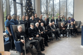 Crew from HMS Prince of Wales met with military veterans in Salford during a memorable visit to Liverpool.