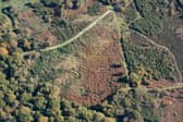 An aerial view of the Browndown First World War practice trenches in Gosport, Hampshire. Practice trenches from the First World War, a "bungalow maternity ward" and the tomb of a woman believed to have lived to 119 years old are among the places that have been added to the National Heritage List for England by Historic England.