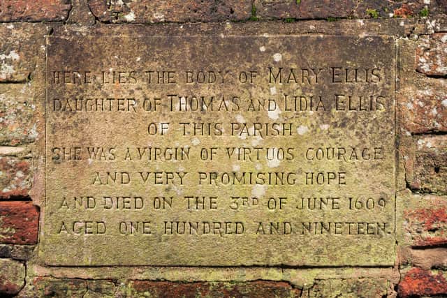 A 1970s carved plaque on the side of Mary Ellis' tomb in St Clement's churchyard.