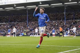 Pompey's Callum Lang celebrates his incredible four-goal haul against Coventry City today. Pic: Jason Brown/ProSportsImages