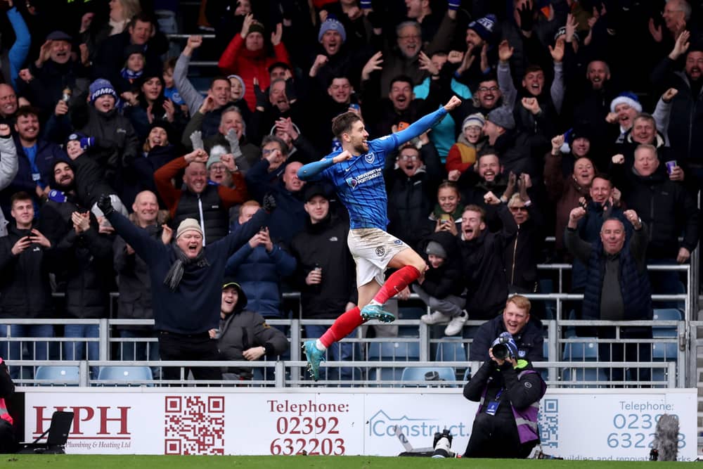 Pompey's in-form Callum Lang has promised he has happy to stay at Fratton Park, amid his flying form. Pic: PA