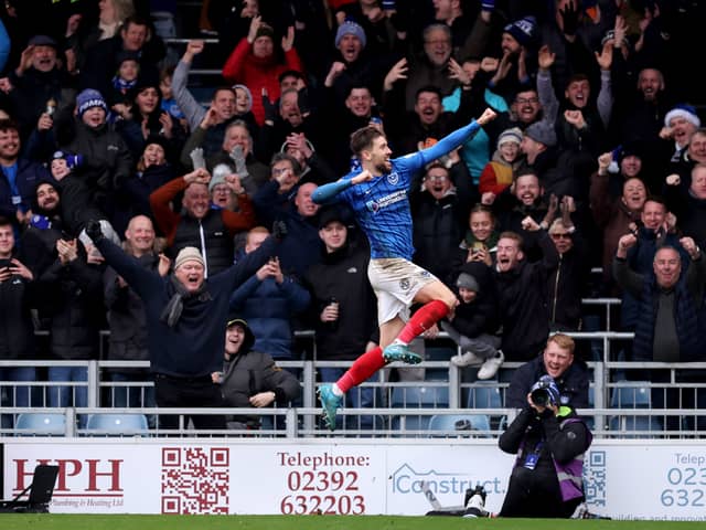 Pompey's in-form Callum Lang has promised he has happy to stay at Fratton Park, amid his flying form. Pic: PA
