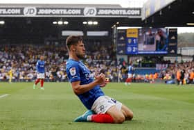 Callum Lang was the hero for Portsmouth in an emphatic victory over Coventry City.
