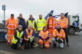 Photo caption: Leader Cllr Peter Chegwyn (back, centre) alongside Gosport Mayor Cllr Richard Earle (back, third from left), Deputy Mayor Cllr Kirsten Bradley (front, furthest left) and TJ Waste & Recycling staff at the final community skip of 2024 at Alver Valley West car park. Taken by Steven Phyall at Zooming Photography.