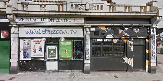 The empty shop next to the One Eyed Dog