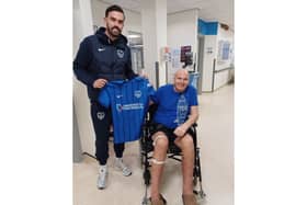 Pompey captain Marlon Pack, paid a visit to season ticket holder Mick Clifford who was spending Christmas in QA Hospital.