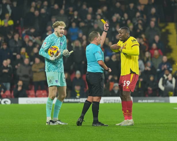 Referee Geoff Eltringham and his assistant faced criticism from Pompey boss John Mousinho after the 2-1 loss at Watford. Pic: PA