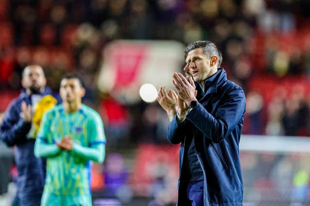 John Mousinho has defended his decision to drop key players to Pompey's bench against Bristol City. Picture: Nigel Keene/ProSportsImages