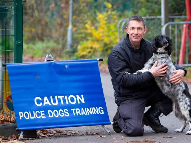 Police dog support unit instructor, Paul Sainsbury, with police dog Ossie