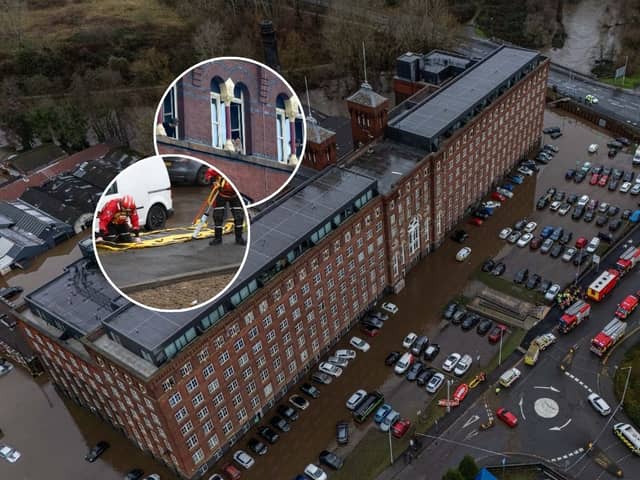 Car are flooded outside a newly converted Meadow Mill on Water street in Stockport as emergency teams arrive to rescue people trapped inside. January 1 2025.
