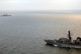 HMS Somerset (foreground) maintaining watch on Russian corvette RFS Soobrazitelny. Nearly 200 Royal Navy sailors were recalled to their ship on Christmas Day to deploy to shadow Russian warships for 500 miles in the North Sea and through the English Channel.