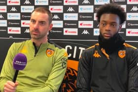 Abu Kamara, right, with Hul boss Ruben Selles during their joint-press event on Friday