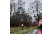 A car overturned after driving into standing water on a flooded section of the A3 near Bramshott.