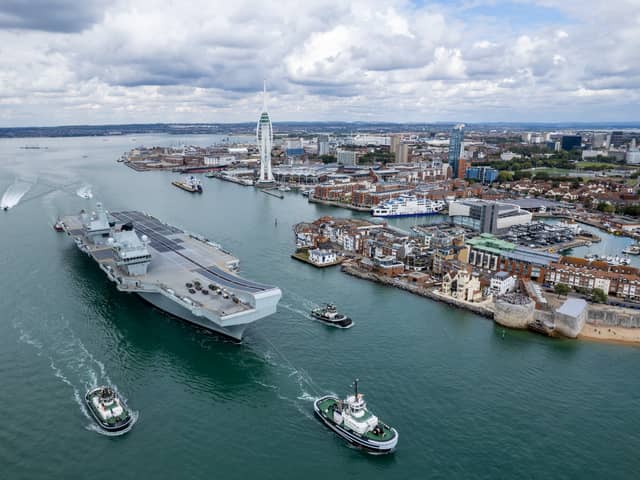 Dockyard workers in Portsmouth have voted to strike due to an ongoing contract row between the Ministry of Defence and Serco for tug and other infrastructure services. The News understands redundancy consultations are taking place at the company. Pictured: HMS Prince of Wales leaving Portsmouth Harbour with a tug escort.