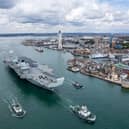 Dockyard workers in Portsmouth have voted to strike due to an ongoing contract row between the Ministry of Defence and Serco for tug and other infrastructure services. The News understands redundancy consultations are taking place at the company. Pictured: HMS Prince of Wales leaving Portsmouth Harbour with a tug escort.