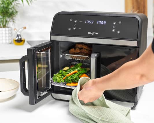 The dual doors of the XL Air Fryer Oven make access really easy