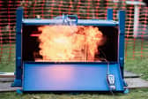 FLAMMABLE: A smartphone lithium-ion battery bursts into flames in a safety test by Barnbrook Systems in Hampshire. A similar battery is linked to a fire which destroyed a materials recovery facility for construction waste in Portsmouth in July 2024