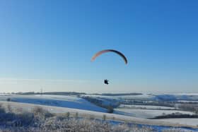 A paraglider gets a birds eye view of the wintry conditions