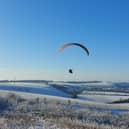 A paraglider gets a birds eye view of the wintry conditions