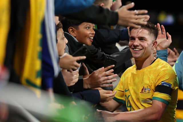 Cameron Devlin plays for Australia just like Kusini Yengi. There's an Australian contingent at Fratton Park.