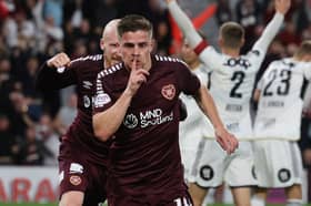 Hearts midfielder Cammy Devlin has been linked with a move to Pompey