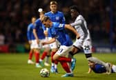 Romain Esse (R) could be set for a move to the Premier League after playing Pompey. The Millwall star is wanted by Crystal Palace. 