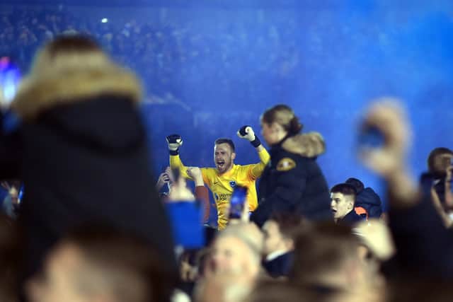 Will Norris and Pompey fans celebrate the League One title win against Barnsley.