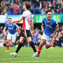 Kyle Bennett celebrates scoring Pompey's second in the 6-1 demolition of Cheltenham which clinched the League Two title in May 2017. Picture: Harry Murphy/Getty Images