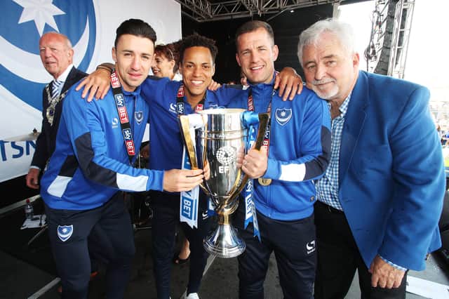 Kyle Bennett joins Enda Stevens, Michael Doyle and Pompey chairman Iain McInnes at the Southsea Common celebrations having won the League Two title. Picture: Joe Pepler